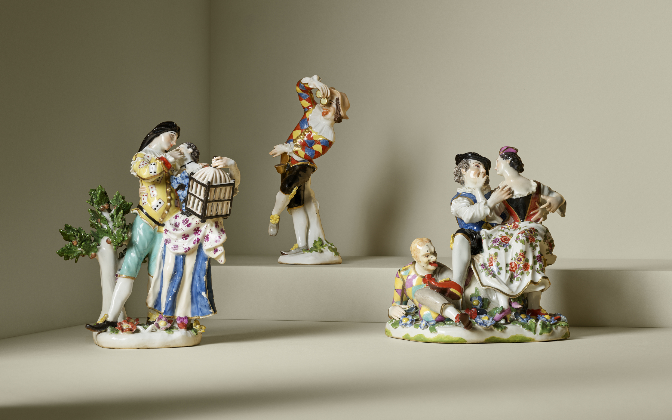 Two Meissen porcelain groups and a figure of Harlequin, all circa 1740s, offered in Meissen Figures and Snuff-boxes from the Collection of Franz E. Burda until 25 September 2024 at Christie's Online